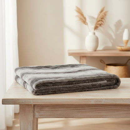 grey and white blanket with subtle animal pattern for home comfort