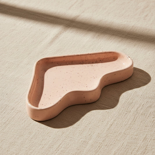 triangle ceramic tray with speckled peach glaze and wave design