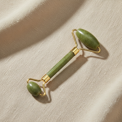 jade facial roller used for face massage and skincare routine