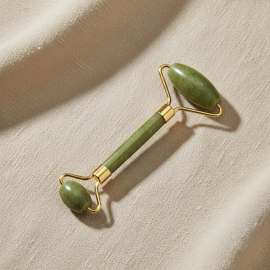 jade facial roller used for face massage and skincare routine