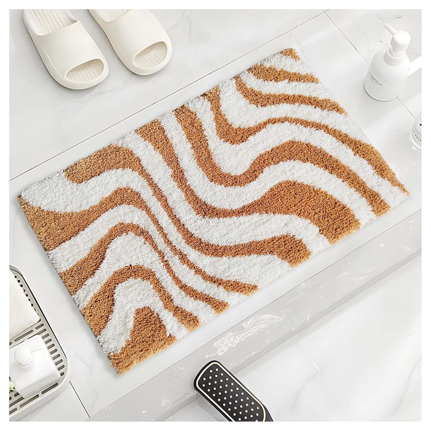 orange and white microfiber bath mat with non slip backing on bathroom floor