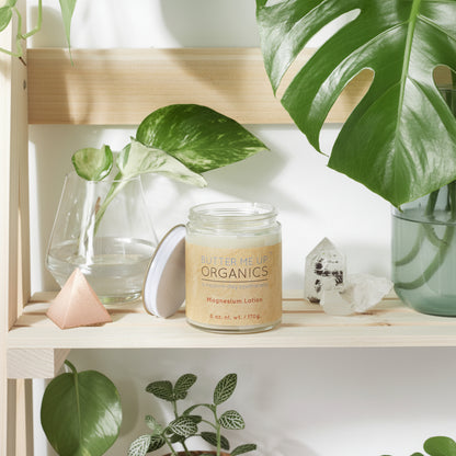 organic magnesium lotion in glass jar with metal lid for natural skincare