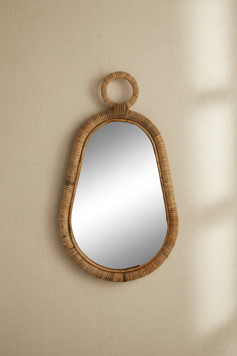 natural rattan wall mirror in brown tone rectangular shape hanging on wall