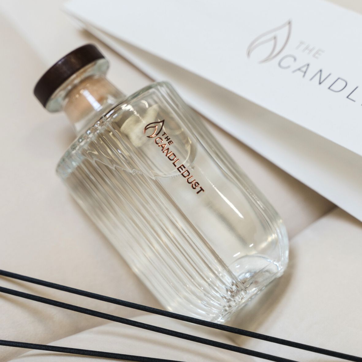 large room diffuser with reed sticks and citrus floral scent
