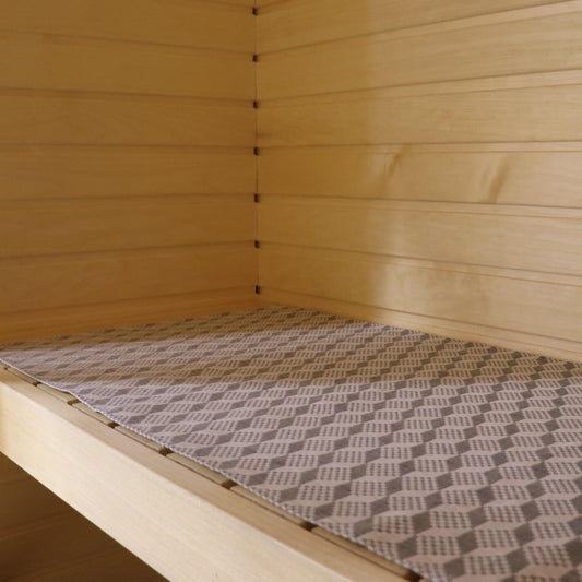 sauna seating pad with traditional pattern made from linen and cotton