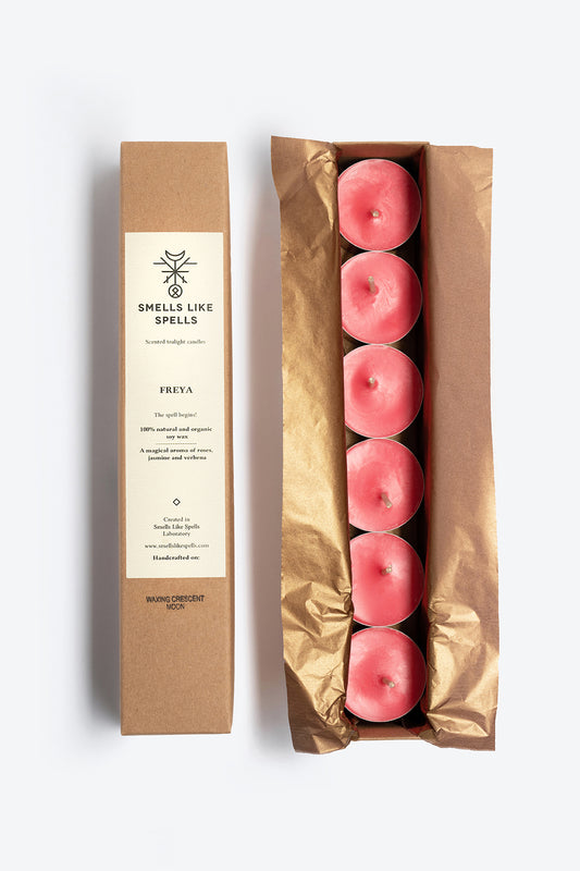 set of scented tealight candles with soft floral and warm fragrance