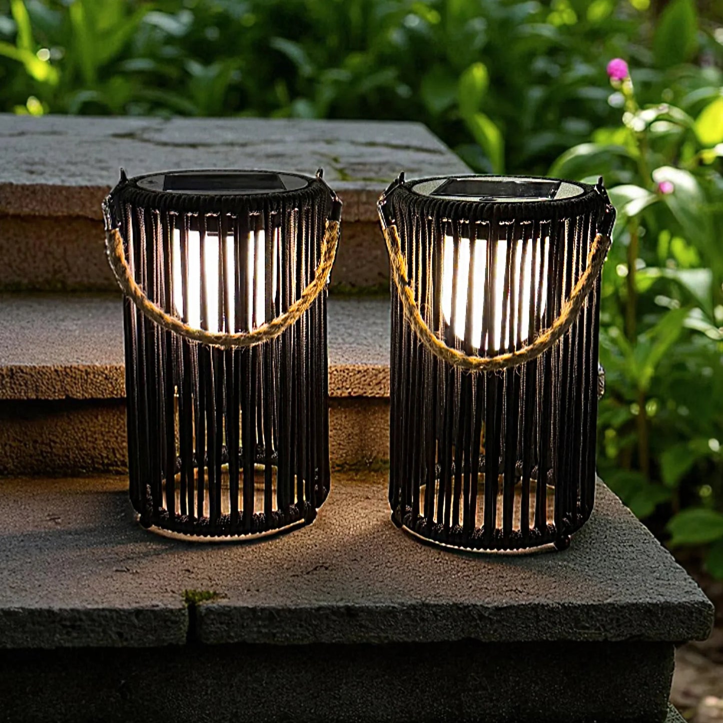set of two black solar outdoor lanterns with rope handle for garden and patio lighting