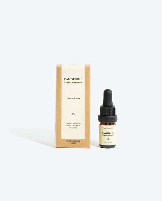 tangerine essential oil in glass bottle for fresh citrus aromatherapy