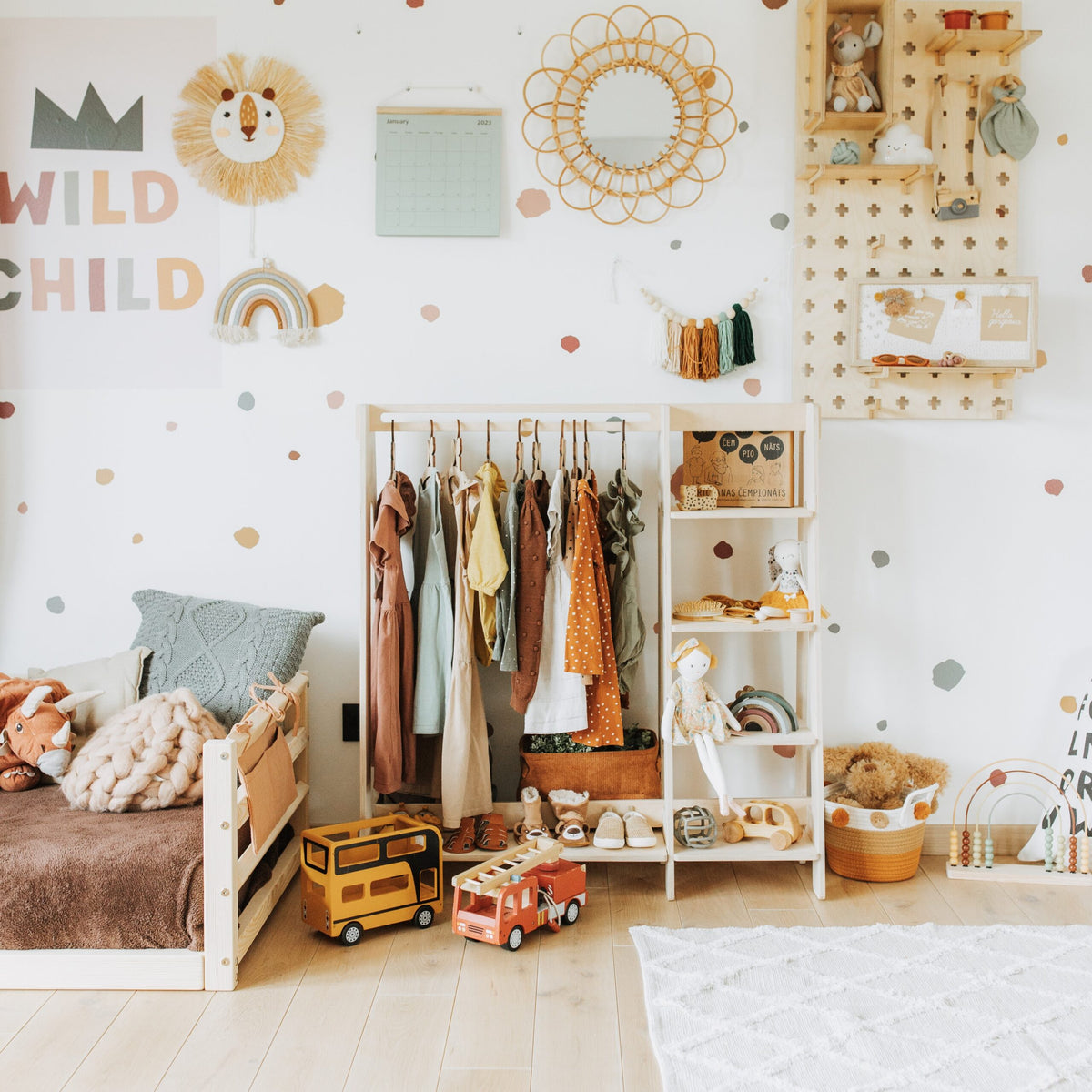 Birch toddler clothing rack with shelves and fabric storage compartment