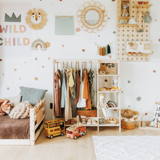 Birch toddler clothing rack with shelves and fabric storage compartment