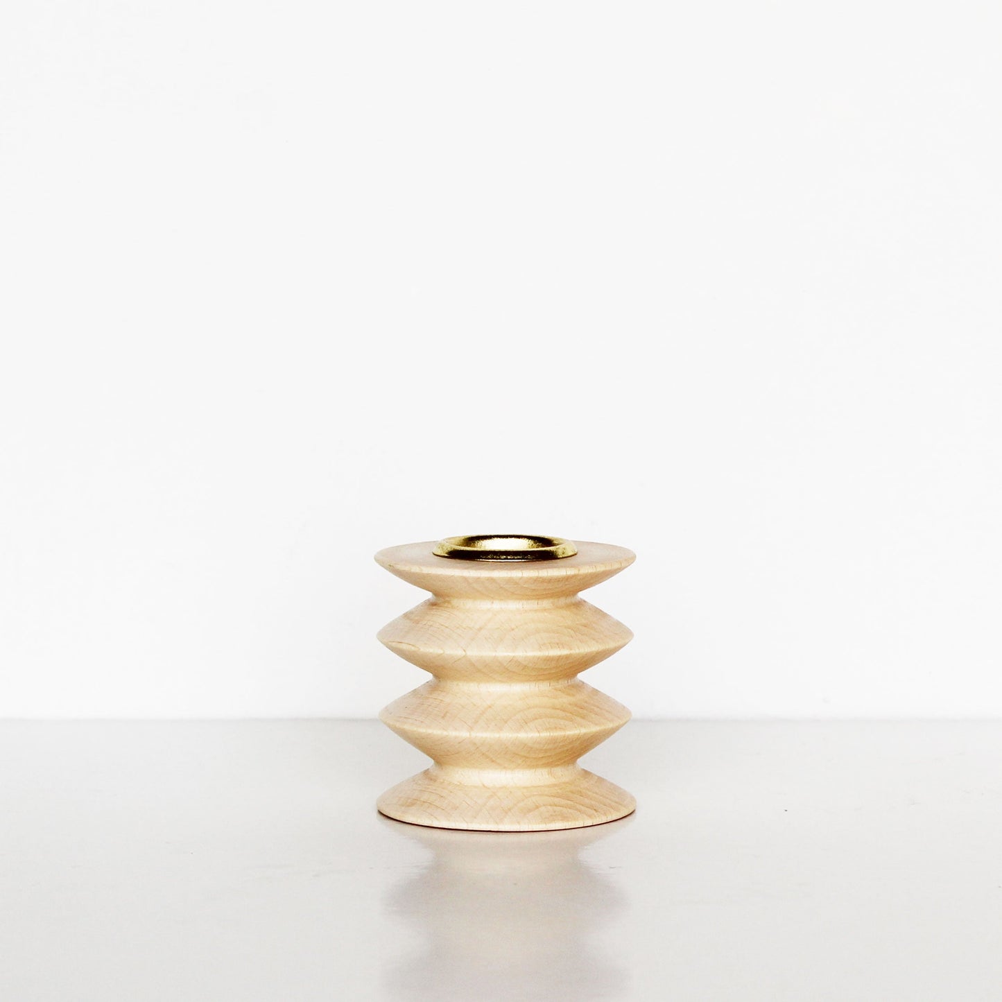 handmade wooden candle holder made of beech wood with brass insert