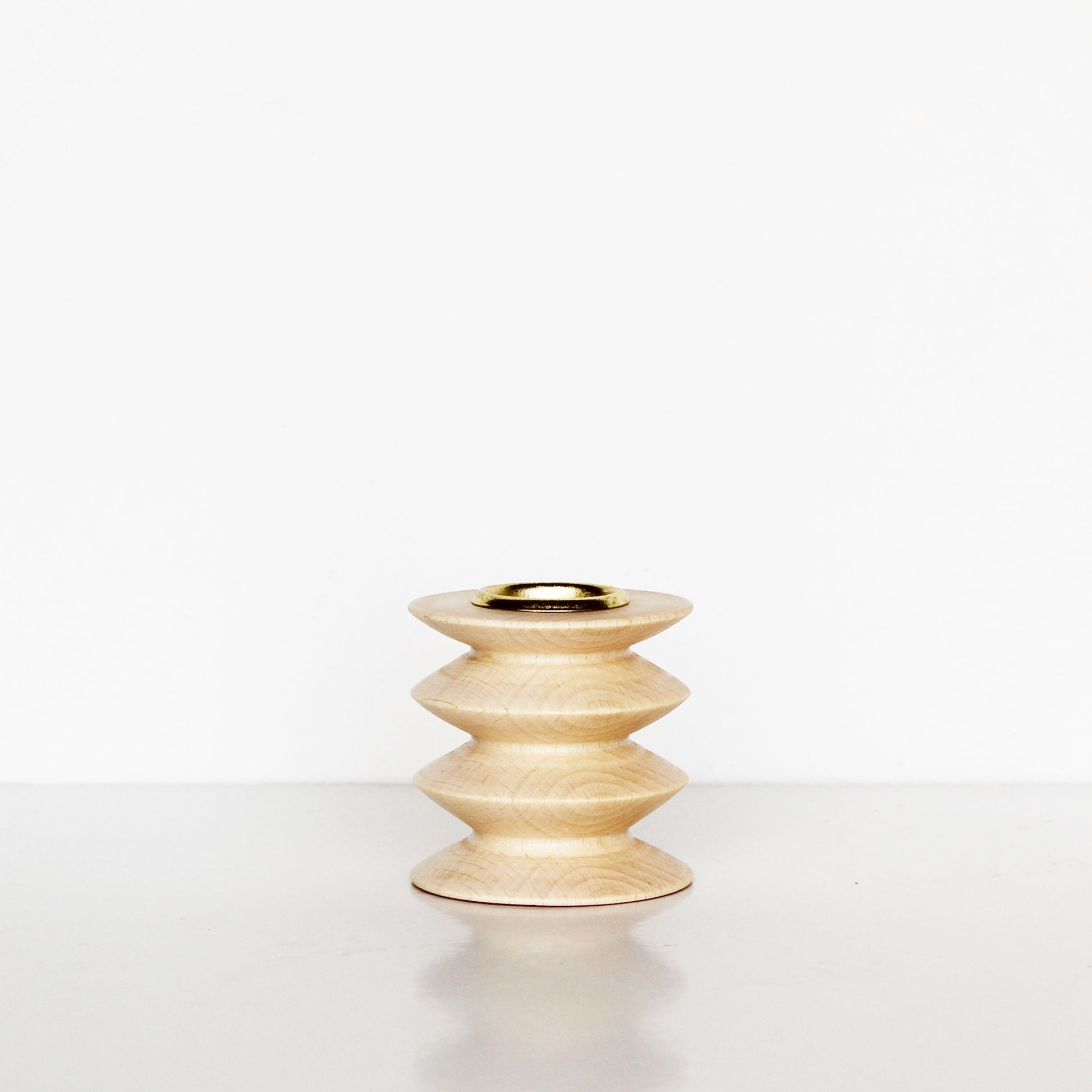 handmade wooden candle holder made of beech wood with brass insert
