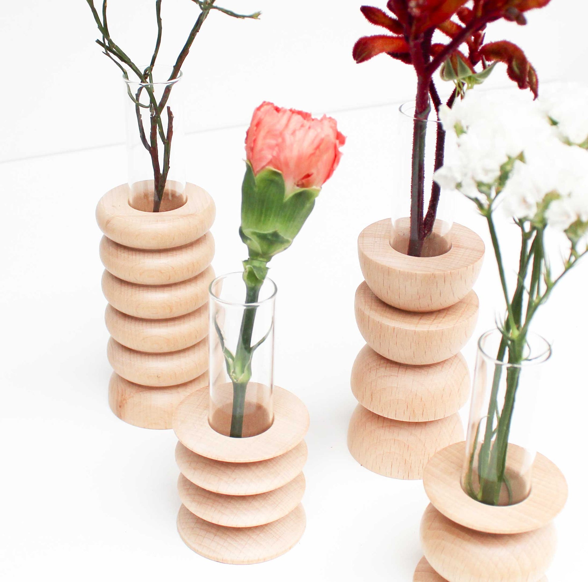 Medium wooden totem table vase made from solid beech wood with glass tube insert